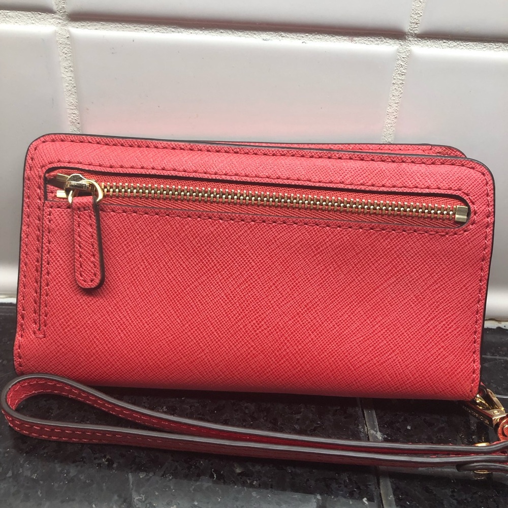 Michael Kors 6 slot wristlet in Beautiful coral 🪸 color, with zipper in back . - Picture 2 of 10